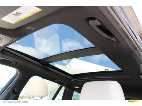The forward section is also in the same position, upon pressing the button to close the roof the front section tries to close and stops then tilts back open again the rear section does not move. . Bmw x3 panoramic sunroof shade repair